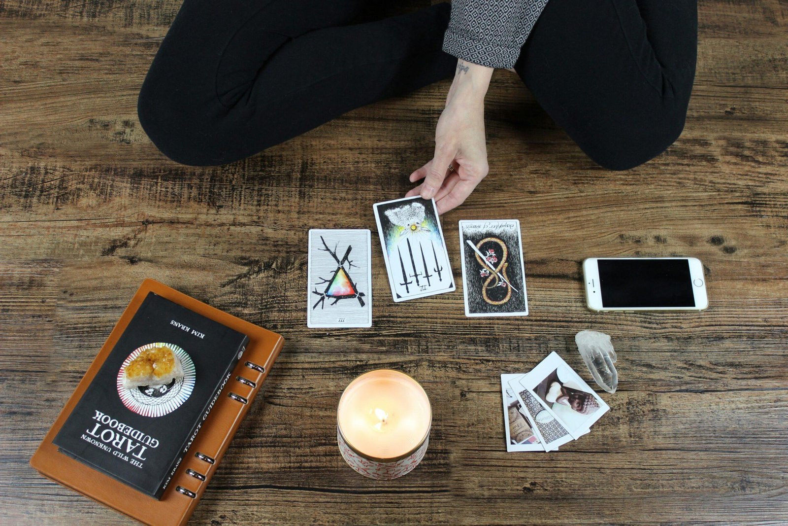 An example of a simple tarot spread laid out on a table, demonstrating the arrangement of cards.